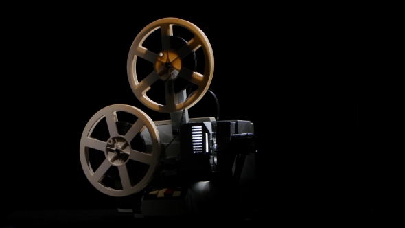Retro Projector Showing Film. Studio Black Background alt
