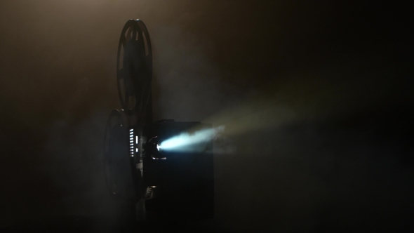 Shows Movie in a Projector in the Smoke. Black Background alt