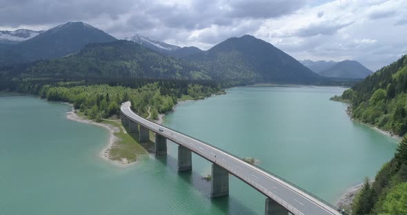 Bridge over mountain lake reservoir, Sylvenstein, Bavaria, Germany