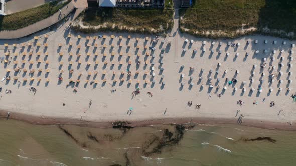 Tourist Beach in Baltic Sea Seen From Aerial Birds Eye Overhead Top Down Drone View Beach with