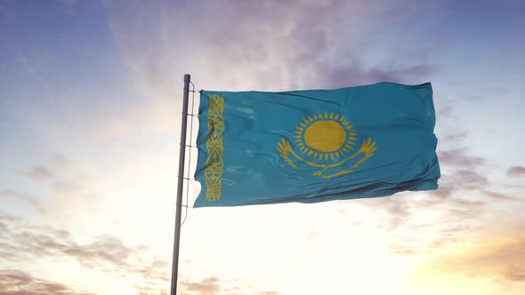 Kazakhstan Flag Waving in the Wind Dramatic Sky Background