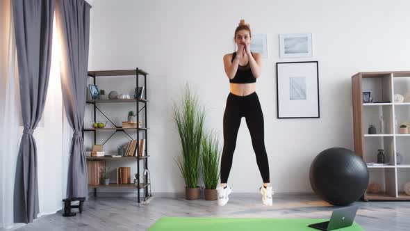 Sport at Home Virtual Gym Woman Jack Squat Jumping