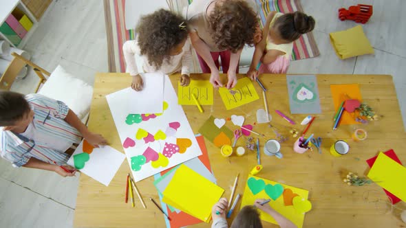 Top View of Kids Making Greeting Cards for Mothers alt