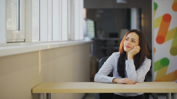 Brunette Office Worker Feels Boring on Working Place Indoors