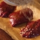 Chicken Liver Is Spread on a Beautiful Plate and Collapses in Sesame Seeds. - VideoHive Item for Sale