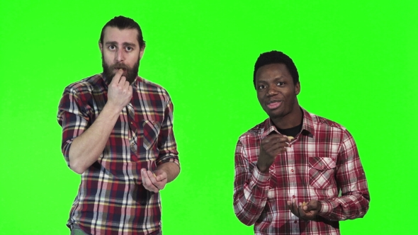 Two Men Eating French Fries on Green Screen