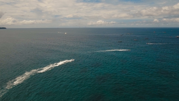 Riders on Jet Ski. Boracay Island Philippines