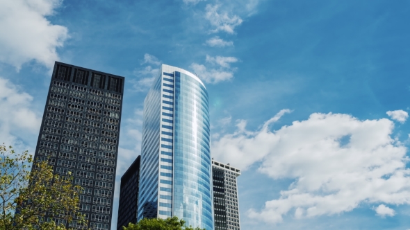 Modern Office Building Made of Glass Against the Sky