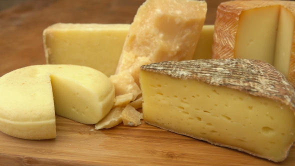 French of Cheese on a Wooden Table.