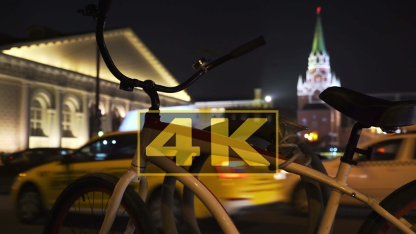 Concept City Bike and Night City Traffic Near Moscow Kremlin in Blur