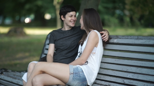 Beautiful Lesbians Kisses and Hugs on Bench