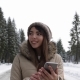 Asian Girl Winter Snow Forest Walk Young Woman Messaging Online Smart Phone Happy Smile - VideoHive Item for Sale