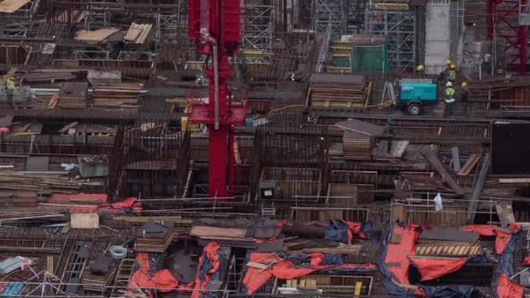 View of Construction Area with Builders in Work. Kuala Lumpur, Malaysia alt