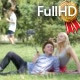 Teenagers on a Picnic on a Lawn Taking Photos - VideoHive Item for Sale