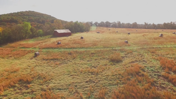 Aerial of Round Hay Bales on Farm