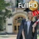 Graduand in Mantle Raises Her Fists Shows Diploma - VideoHive Item for Sale
