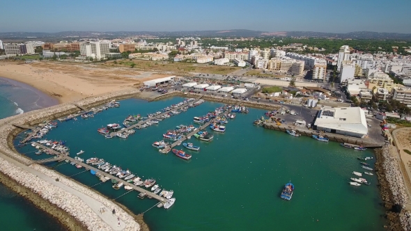 Aerial. Fishing Port and Moored Ships Town Quarteira.