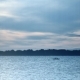 Silhouette of a Boat at Dusk on River - VideoHive Item for Sale