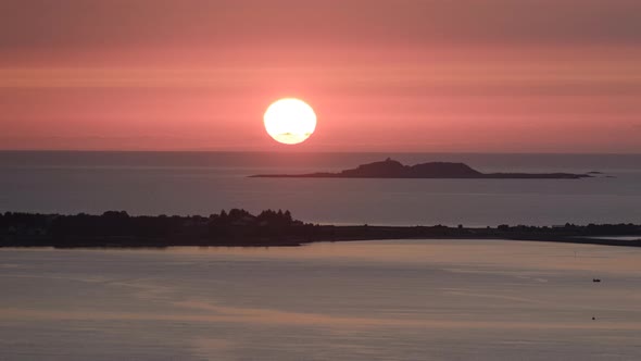 Time Lapse of Sunset above Ocean taken from Aksla Viewpoint, Ålesund Norway (West Coast).With Islan