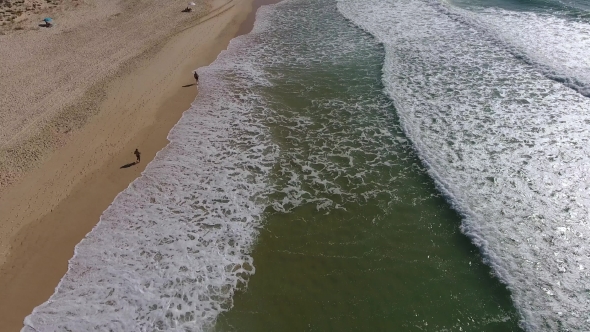 Aerial Shoot Video, Running Man on Beach