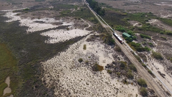Rails for a Train From the Sky, Through the Ria Formosa To the Beach Barry