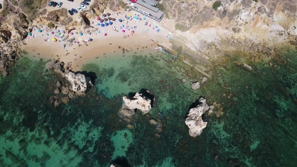 Aerial. Footage of the Clear Waters with Tourists, Beach Arrifes.