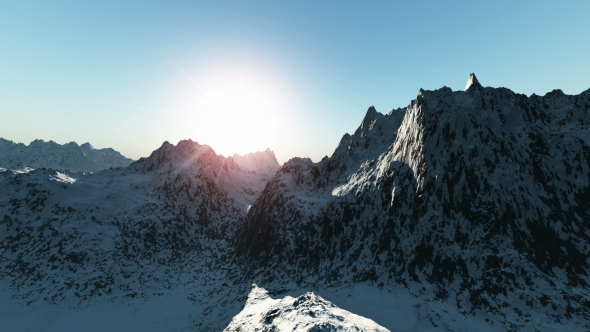 Mountains in Snow at Sunset