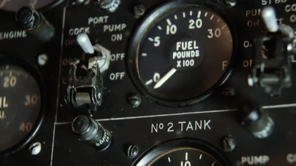 Aircraft Fuel Gauge Indicator in a Vintage War Plane.
