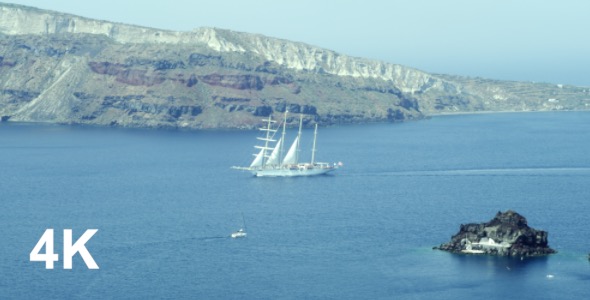 Sailing Brigantine Near The Coast Of Santorini