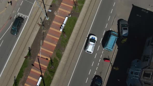 Top View of a Police Car Moving on the City Road