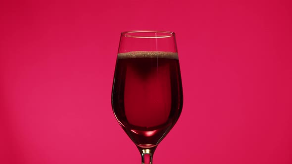 Foamy Cherry Beer in Glass Closeup Belgian Lambic