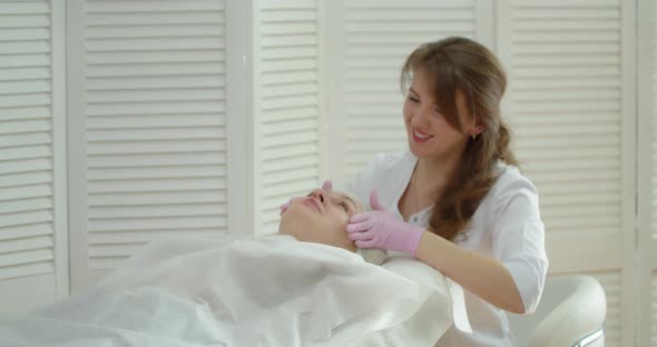Cosmetic Facial Massage With Cream. Beauty Clinic 
