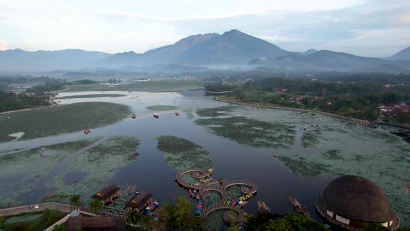 Aerial view of Situ Bagendit is a famous tourist spot in Garut with mountain view.