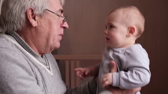 Family Relations of Elderly Man and Baby Girl