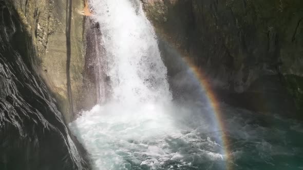 Waterfall on a mountain river aerial view