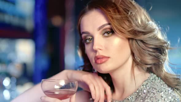 Closeup Portrait of Sexy Woman Drinking Cocktail From Glass Having Good Time at Luxury Night Party