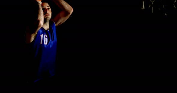 Male basketball player playing in the court 4k