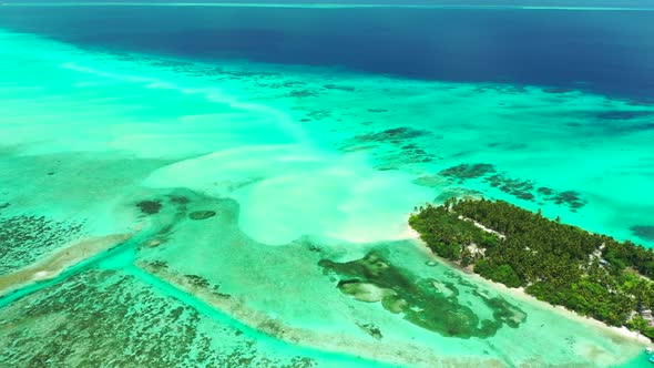 Aerial drone travel of tropical bay beach lifestyle by aqua blue water and white sandy background of