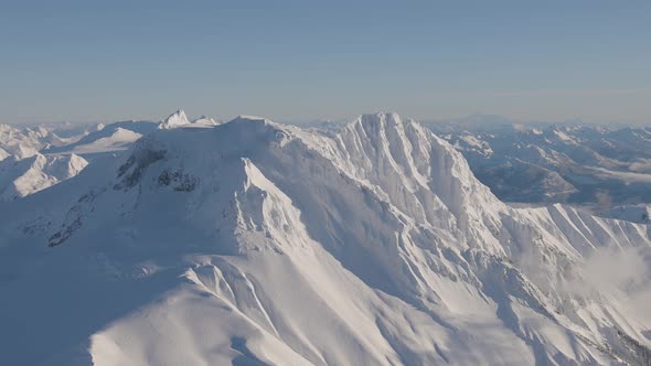 Aerial View of Canadian Mountain Covered in Snow