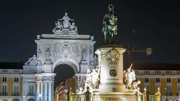 Triumphal Arch at Rua Augusta and Bronze Statue of King Jose I at Commerce Square Night Timelapse in