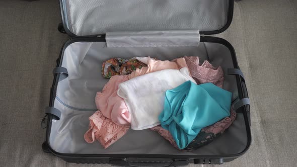 Lady Quickly Packs Things