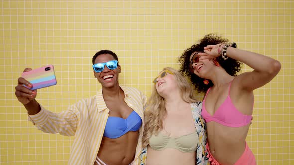 young women having fun on the beach