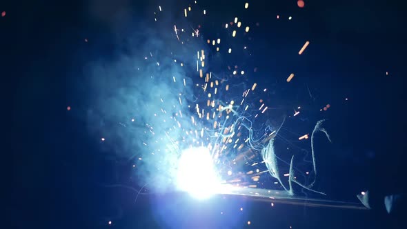 Blurred Sparks and Light Caused By Metal Welding