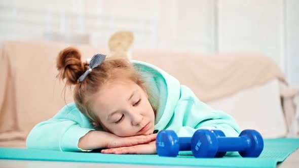 A Primary School Girl is Bored with Physical Education