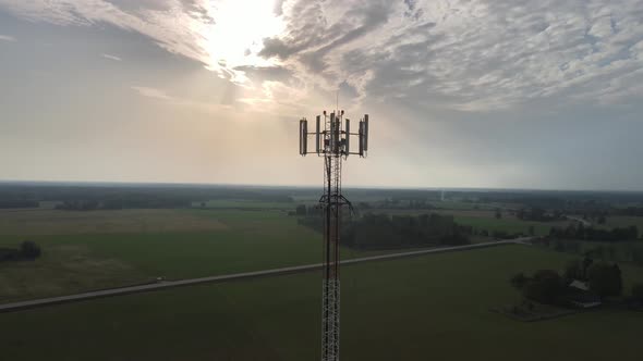 Aerial View To Mobile Telecommunication Tower sunset