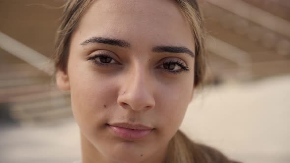 Portrait of a Serious Girl Looking at Camera