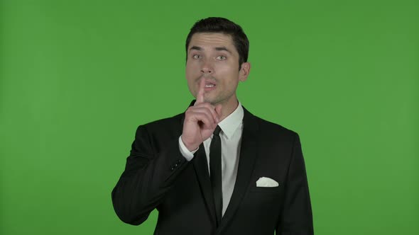 Handsome Businessman Finger on Lips, Chroma Key