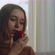 Pretty Woman Bites Red Apple - VideoHive Item for Sale