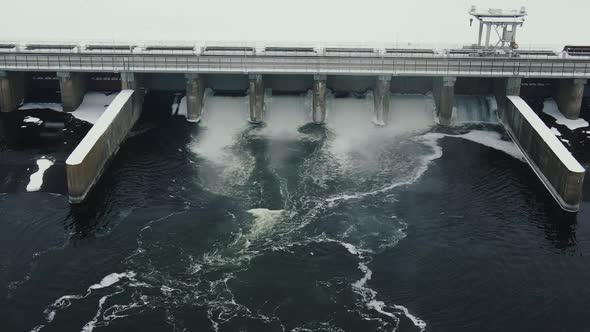 Hydroelectric Dam with Flowing Water Through Gate