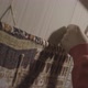 woman weaving a handmade carpet close-up - VideoHive Item for Sale